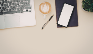 Small business owner writing blog content at a desk